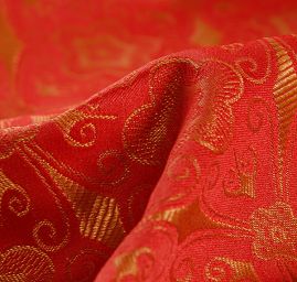 Žakárová tkanina červenozlatá růžice