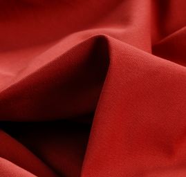 Bavlněná kostýmová látka cihlově červená II.jakost