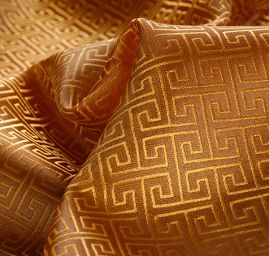 Brokát geometrický motiv zlatohnědý