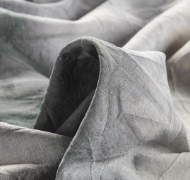 Šatová látka batika šedozelená