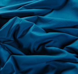 Pružná látka bavlna směs matná tm. tyrkys