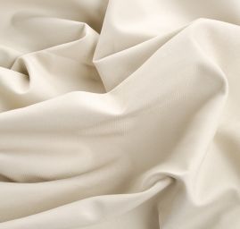 Bavlněná pevnější látka béžovošedé barvy