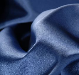 Pružný satén tm. modrý II. jakost vhodný na podšívku