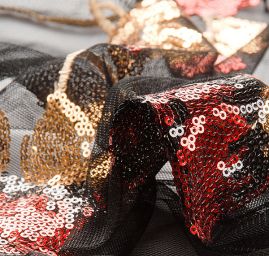 Krajka flitrová výšivka na černém tylu červenozlatá