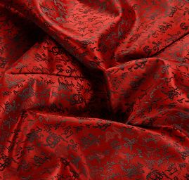 Látka brokát orientální motiv červená