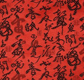 Látka brokát orientální motiv červená