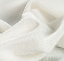 Teplejší silnější úplet buklé slonová kost