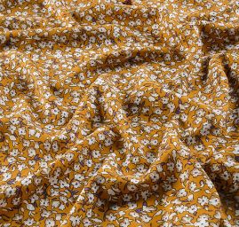 Viskozová šatová látka květy drobné květy okrová