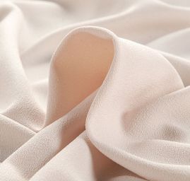 Krepdešín oboustranně pružný těžší béžový