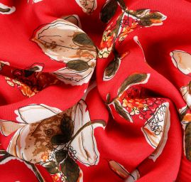 Viskozová šatová látka hnědé květy v malinově červeném