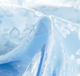 Brokát krojový nepružný pastel světle modrý