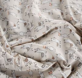 Bavlněné plátno vzor lam na béžovém podkladě