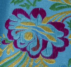 Brokát s folklórním motivem květů modrý