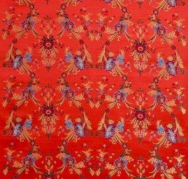 Brokát s folklórním motivem květů červený