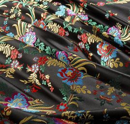 Brokát s folklórním motivem květů černý