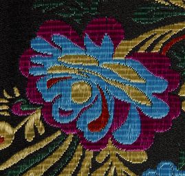 Brokát s folklórním motivem květů černý