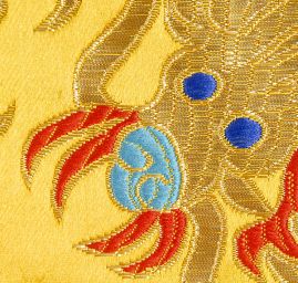 Brokát orientální motiv draka okrový