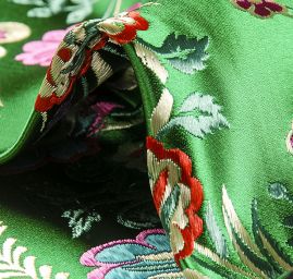 Brokát folklorní květinový motiv velký zelený