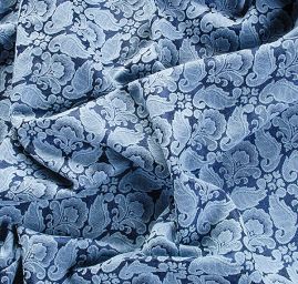 Žakárová látka se vzorem ornamentu modrá