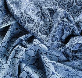 Žakárová látka se vzorem ornamentu modrá