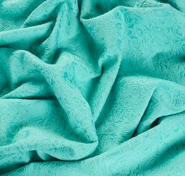 Žakárová pružná látka romantický vzor pistáciová