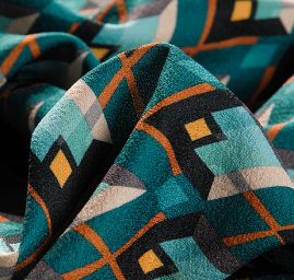 Žoržet šatový pružný tisk art deco vzor tyrkysový