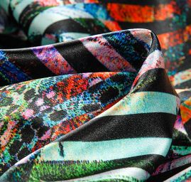 Atlas kupón květ leknínu/proužky oranžovo-modré