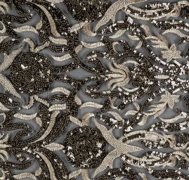 Krajka výšivka na tylu doplněna flitry černozlatá