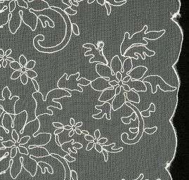 Krajka jemná výšivka na tylu smetanová