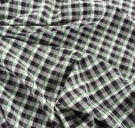 Kostýmová látka vzor kostek černá bílá zelená