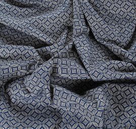 Žakárová látka geometrický motiv modrá/slon. kost