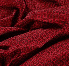Žakárová látka geometrický motiv červená