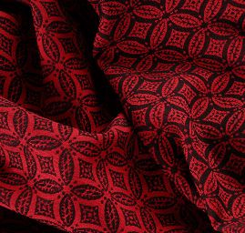 Žakárová látka geometrický motiv červená