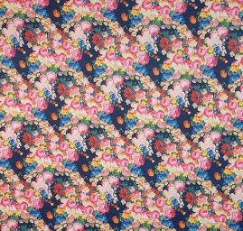 Pletenina s plastickou strukturou piké květy modrá