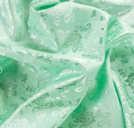 Brokát krojový nepružný hráškově zelená