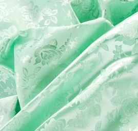 Brokát krojový nepružný hráškově zelená