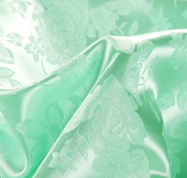 Brokát krojový nepružný hráškově zelená