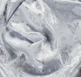 Brokát krojový nepružný sv.šedý