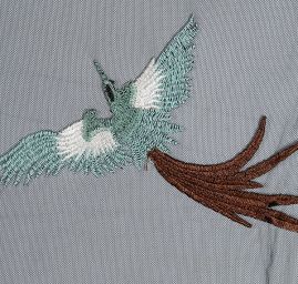 Krajka výšivka na tylu fénix pistácie