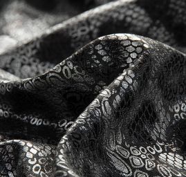 Lamé úplet stříbrný tisk hadí kůže