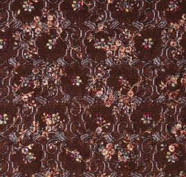 Efektní pružná krajka s nevšedním tiskem hnědá