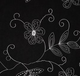 Imitace jelenice černé barvy s výšivkou