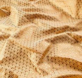 Brokát zlatobéžový jemný geometrický vzor