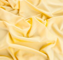 Viskozová šatová látka pastel žlutá