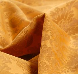 Žakárová látka květinový vzor okrovozlatá
