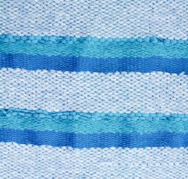 Ručně tkaná látka proužky v modrých barvách