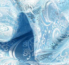 Brokát lamé paisley motiv tyrkysovostříbrný