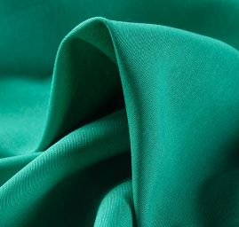 Viskozová šatová látka zelená II. jakost
