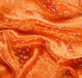 Brokát jemný květinový motiv oranžový