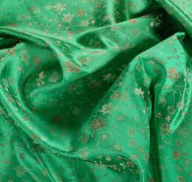 Brokát jemný květinový motiv zelený II.jakost
